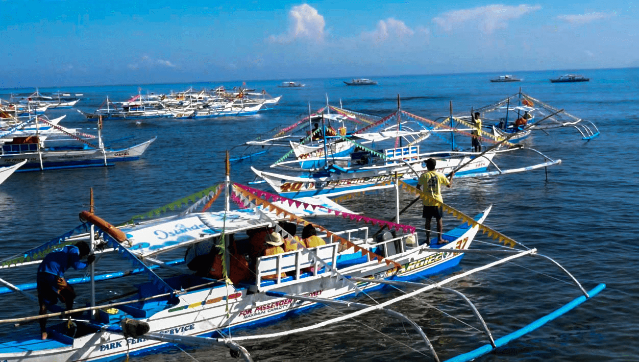 ferry boats in a haven near puerto princesa underground river in palawan philippines